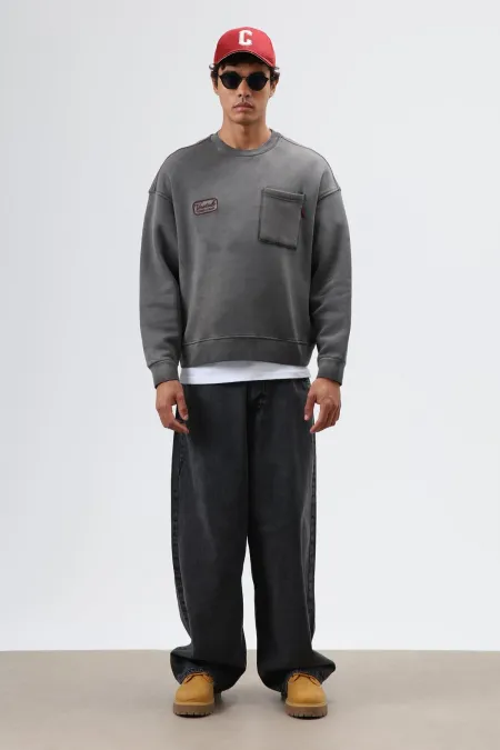 Sweat-shirt oversize à col rond et poches, noir