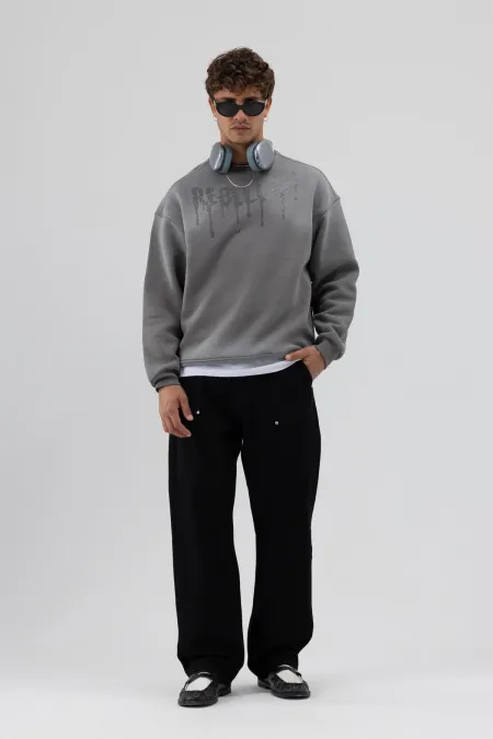 Sweat-shirt noir oversize imprimé délavé