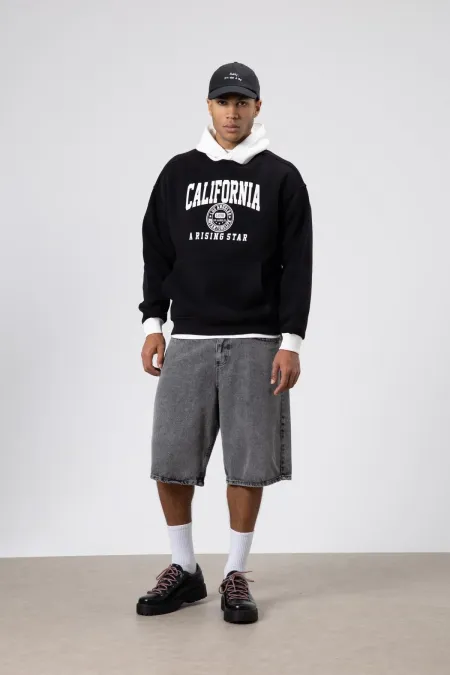 Sweat-shirt oversize noir imprimé bicolore