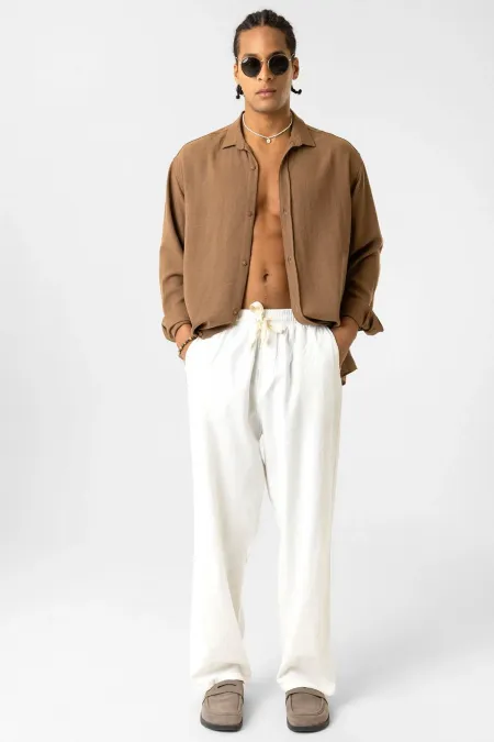 Pantalon ample en lin avec taille élastiquée, écru