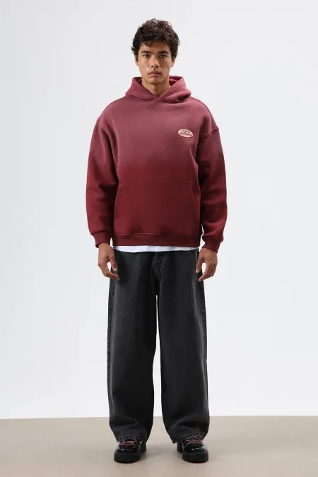 Sweat à capuche oversize imprimé bordeaux