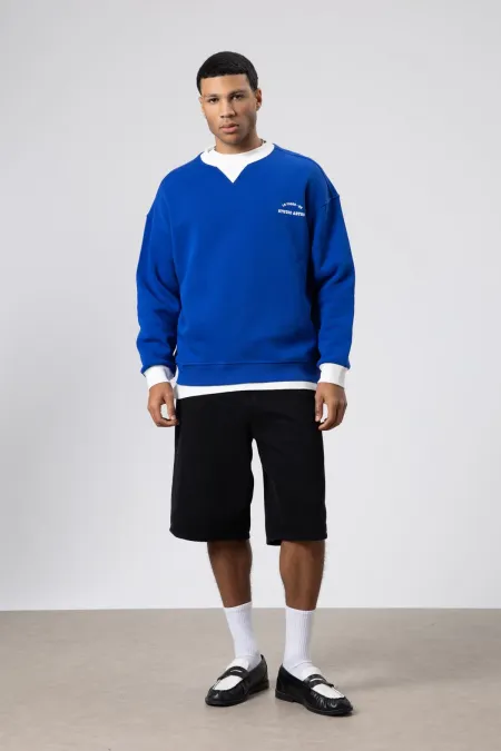 Sweat-shirt oversize à col rond imprimé bleu marine