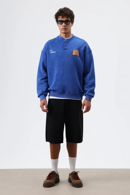 Sweat-shirt oversize à col rond imprimé bleu marine