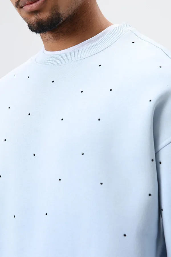 Sweat-shirt oversize bleu ciel à détails pierre délavée