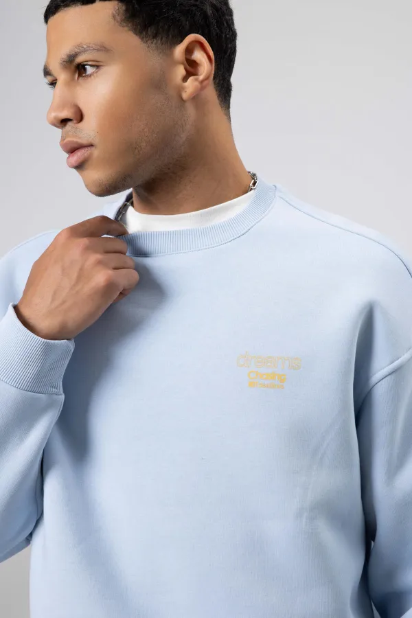 Sweat-shirt oversize à col rond imprimé bleu ciel