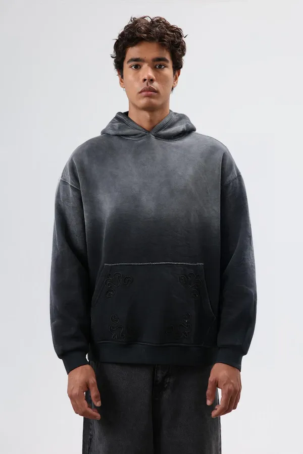 Sweat à capuche oversize noir avec détails brodés