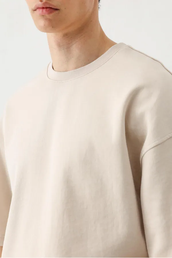 T-shirt oversize délavé à manches courtes couleur pierre.