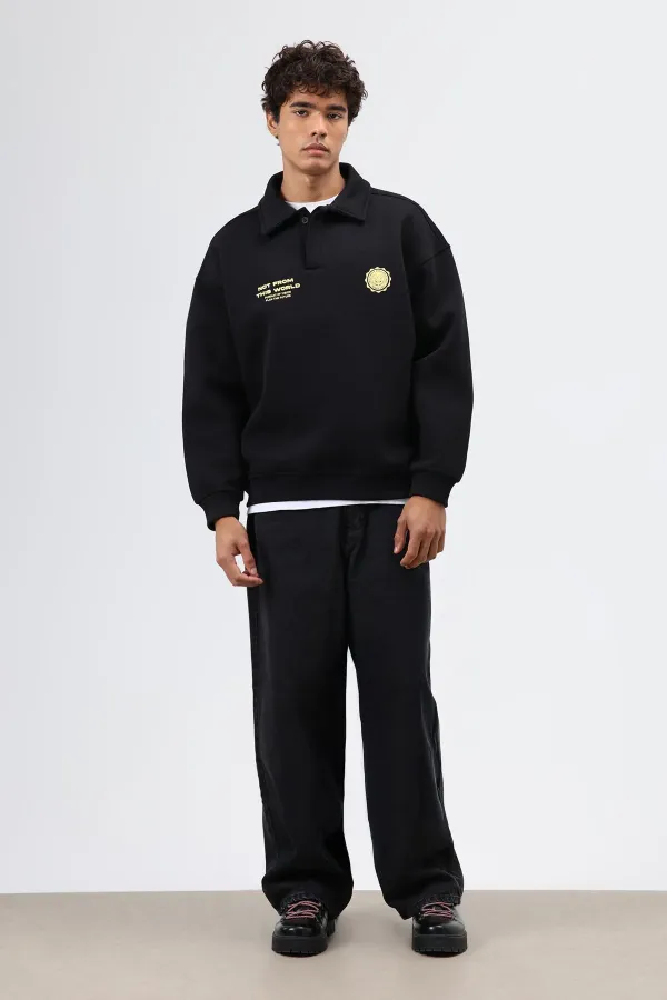 Sweat-shirt noir oversize à col polo imprimé délavé