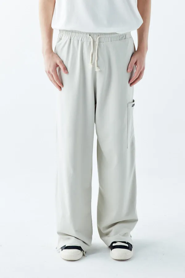 Pantalon de survêtement oversize avec ourlet travaillé et poches latérales, gris glacé