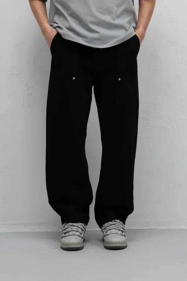 Jean noir ample à poches