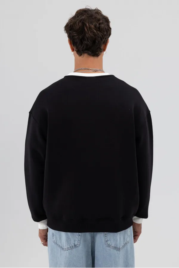 Sweat-shirt noir oversize à col rond imprimé