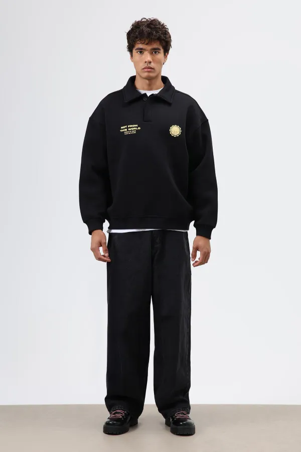 Sweat-shirt noir oversize à col polo imprimé délavé