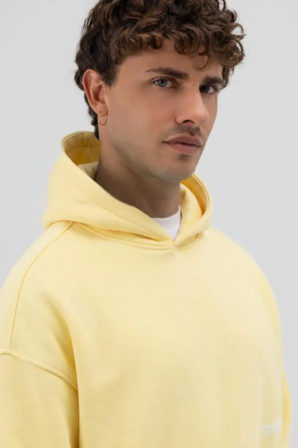 Sweat-shirt à capuche oversize imprimé jaune
