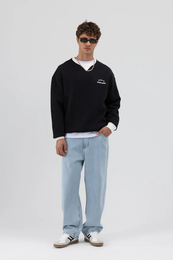 Sweat-shirt noir oversize à col rond imprimé