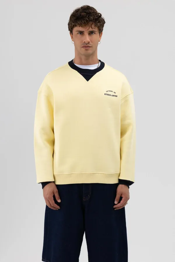 Sweat-shirt jaune oversize à col rond imprimé