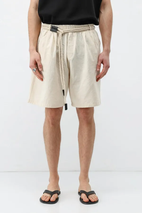 Short oversize en lin naturel avec ceinture