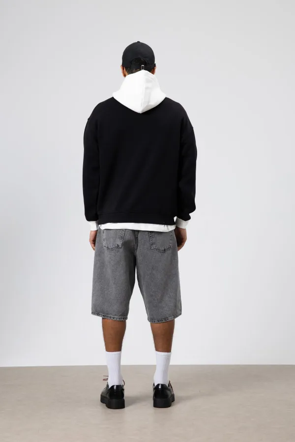 Sweat-shirt oversize noir imprimé bicolore