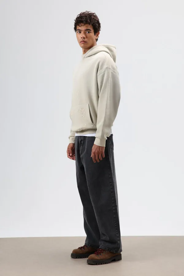 Sweat à capuche oversize beige avec détails brodés