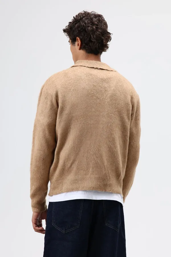 Pull en maille douce texturée beige à col polo