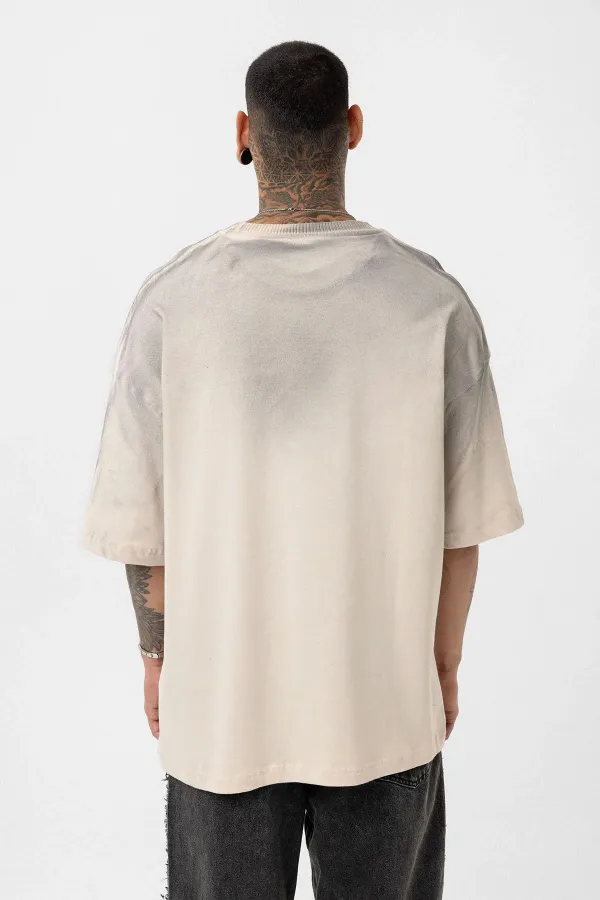 T-shirt oversize délavé avec détails textuels et ornements en pierre