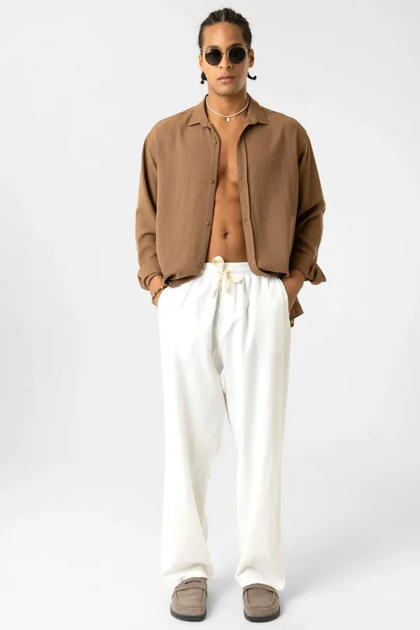 Pantalon ample en lin avec taille élastiquée, écru