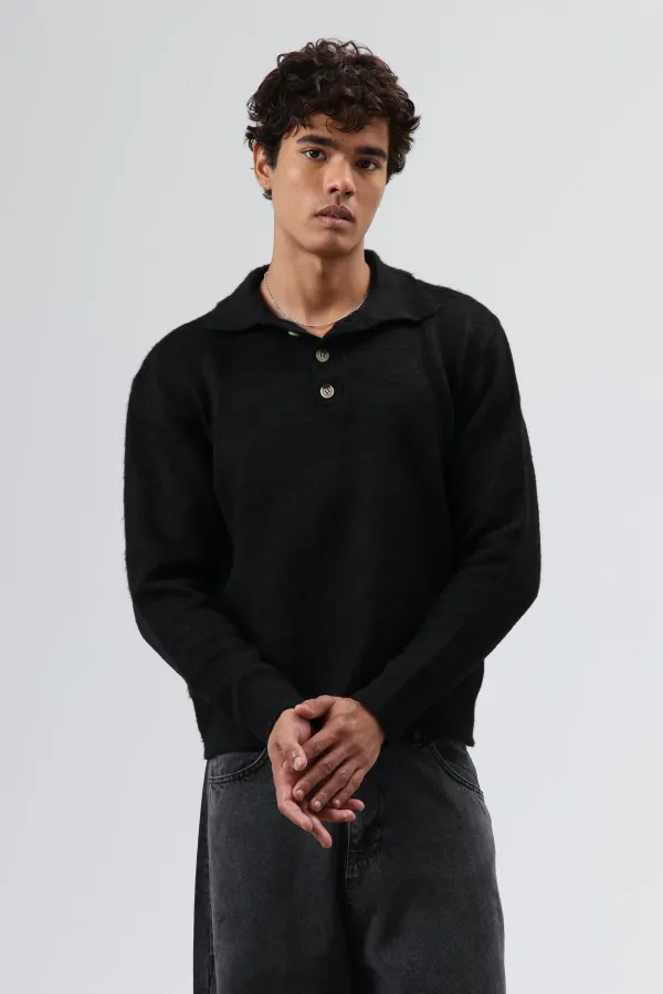 Pull en maille douce texturée à col polo noir