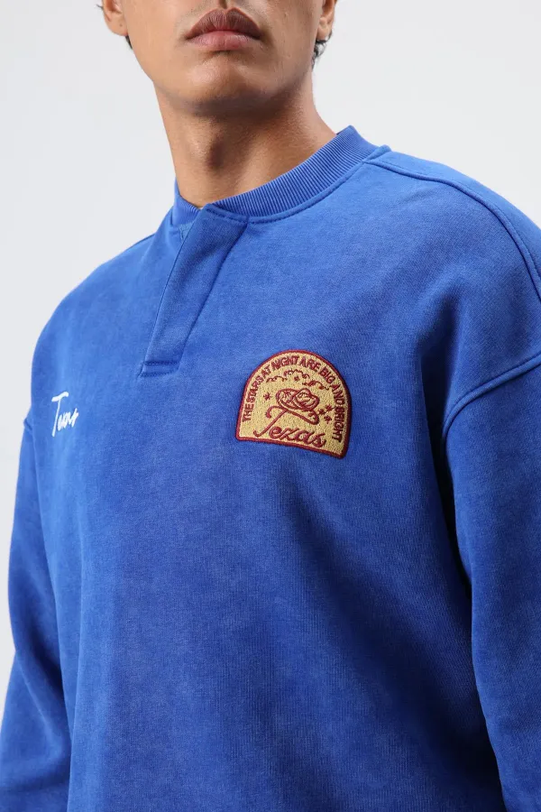 Sweat-shirt oversize à col rond imprimé bleu marine