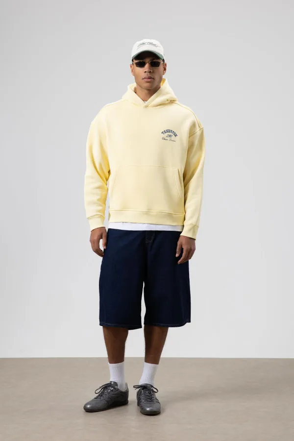 Sweat à capuche jaune oversize délavé à coupe carrée