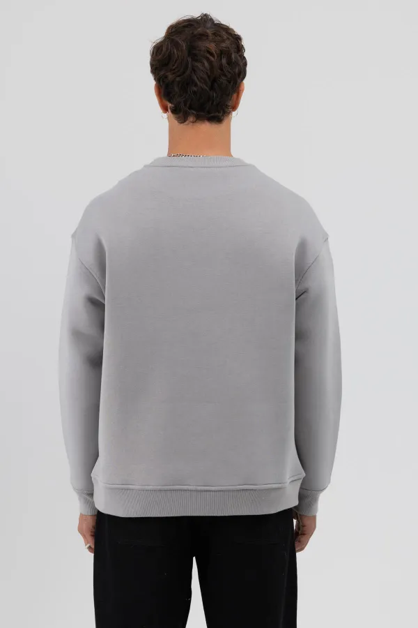 Sweat-shirt gris basique à col rond et coupe oversize