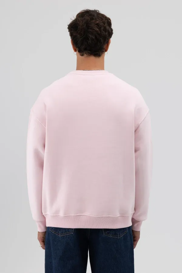 Sweat-shirt rose basique à col rond et coupe oversize