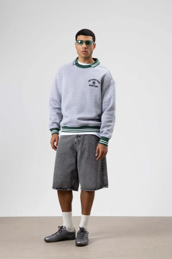 Sweat-shirt gris chiné à col oversize brodé