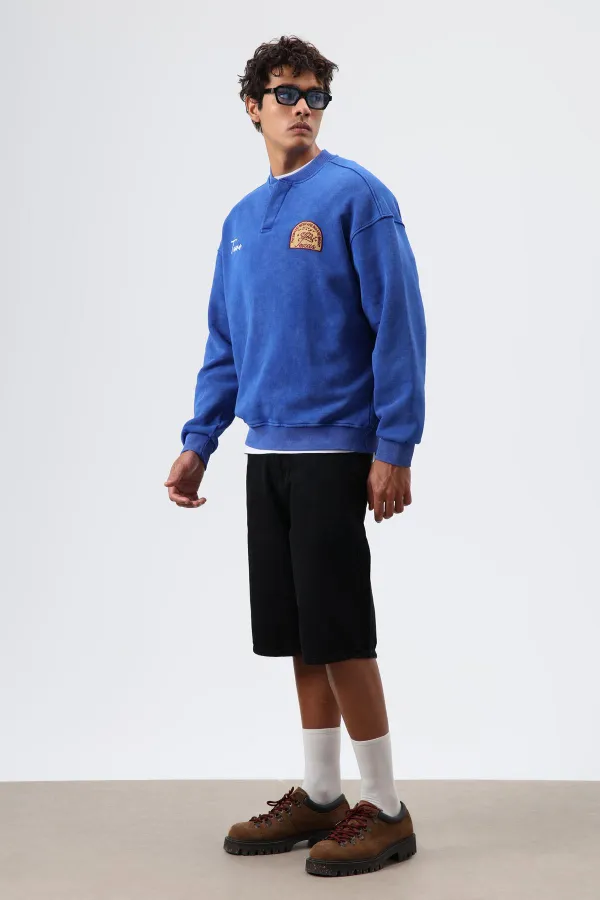 Sweat-shirt oversize à col rond imprimé bleu marine