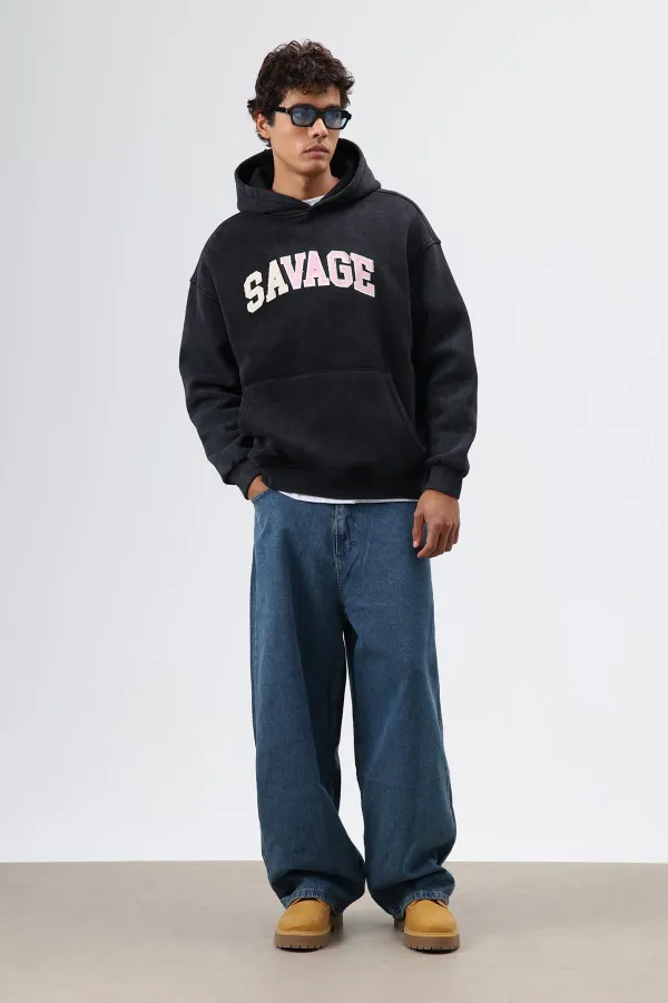 Sweat à capuche imprimé oversize noir