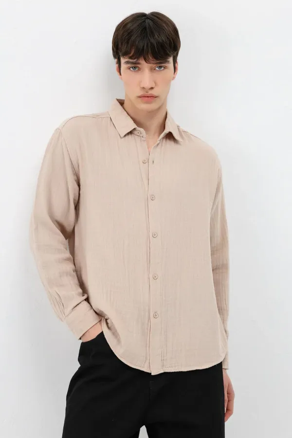 Chemise oversize beige en coton texturé