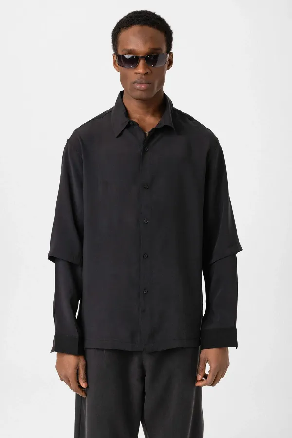 Chemise noire oversize à double manche