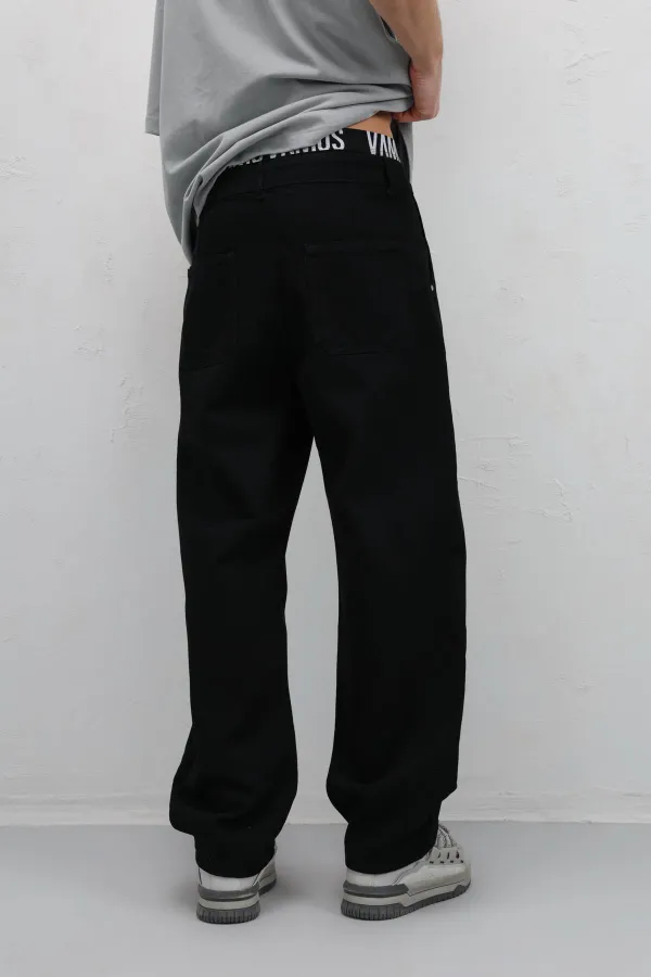 Jean noir ample à poches