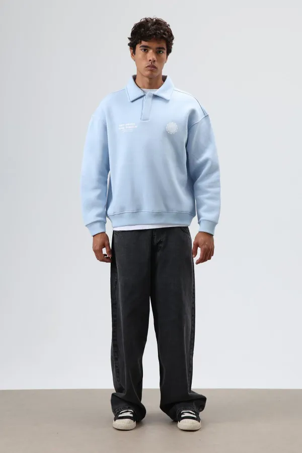 Sweat-shirt oversize à col polo imprimé délavé bleu ciel