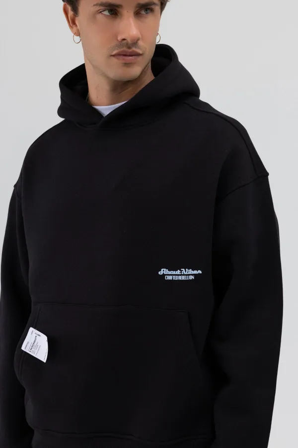 Sweat-shirt à capuche oversize imprimé noir