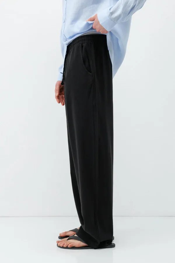 Pantalon ample en lin noir avec taille élastiquée