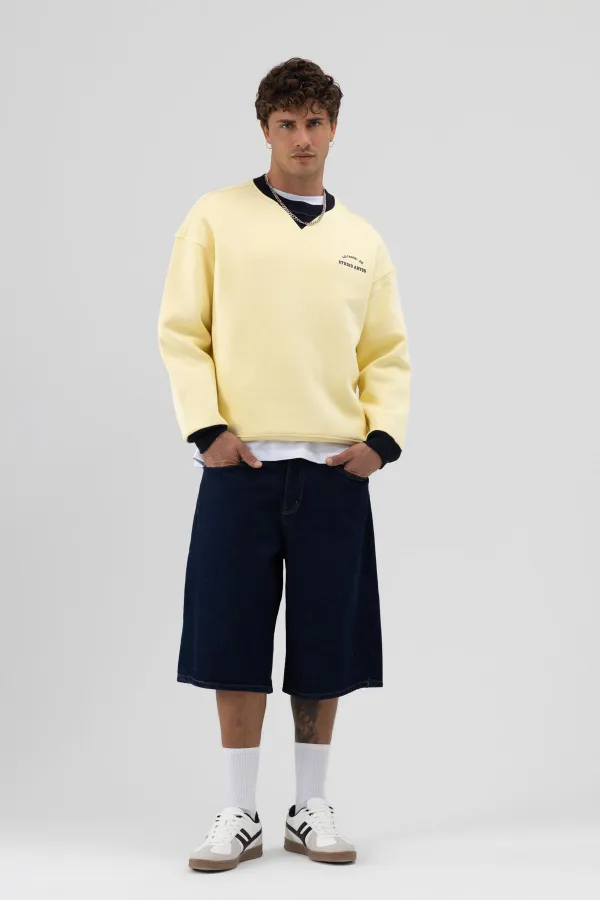 Sweat-shirt jaune oversize à col rond imprimé