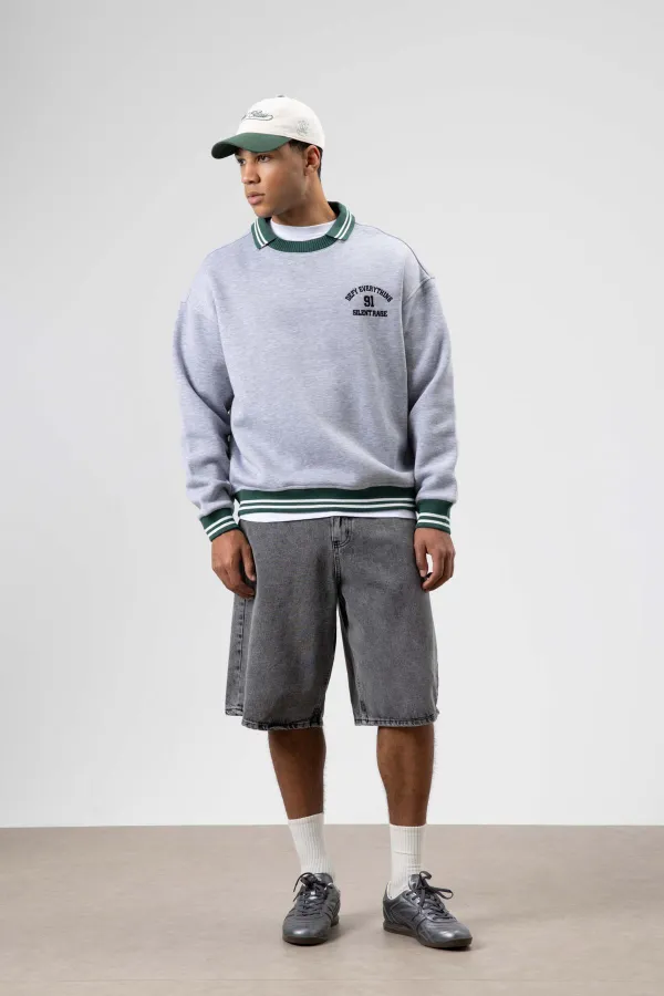 Sweat-shirt gris chiné à col oversize brodé