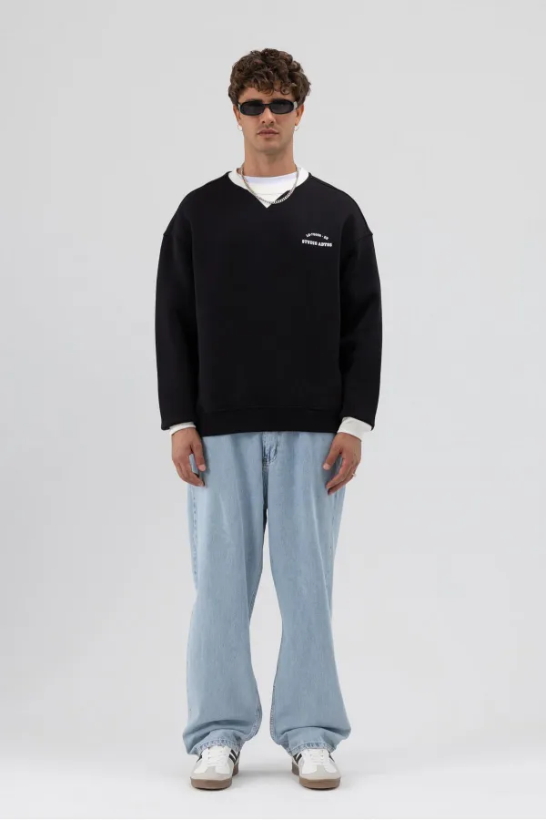 Sweat-shirt noir oversize à col rond imprimé