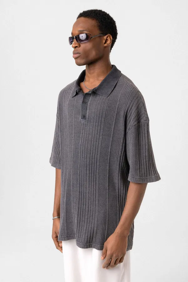 Polo à col oversize en maille noire