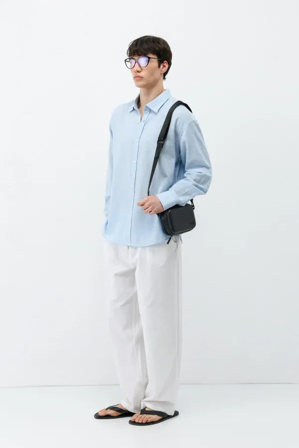 Chemise oversize bleue aspect lin texturé