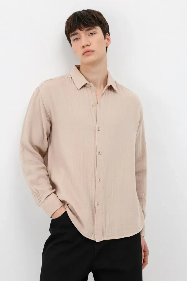 Chemise oversize beige en coton texturé