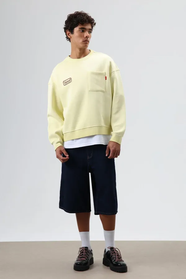 Sweat-shirt oversize à col rond et poches, jaune