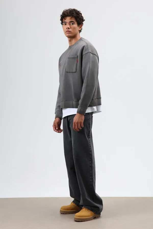 Sweat-shirt oversize à col rond et poches, noir