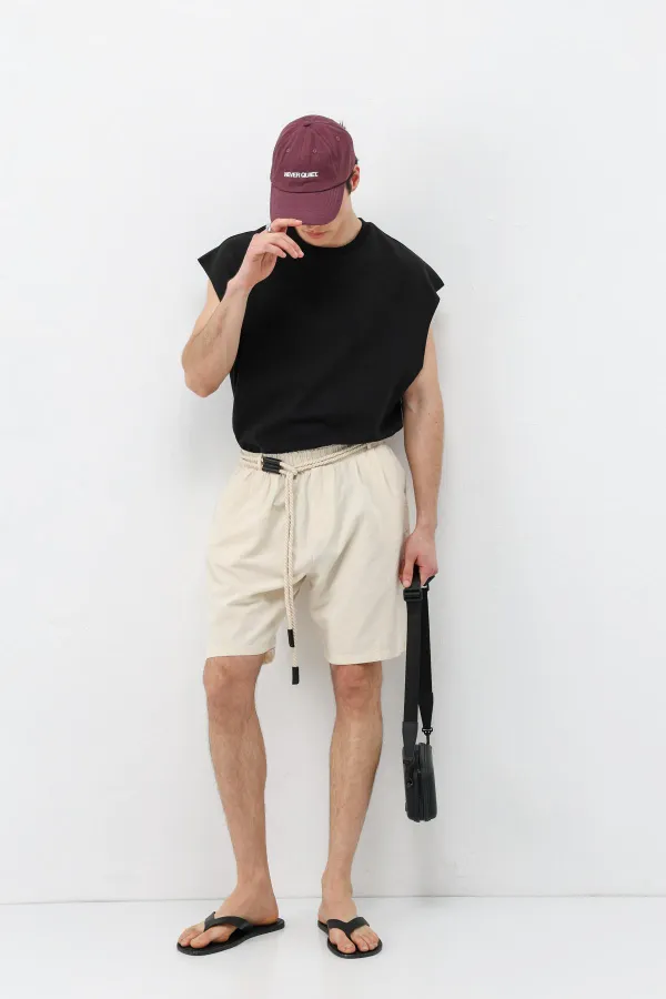 Short oversize en lin naturel avec ceinture