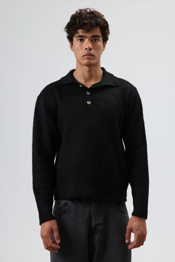 Pull en maille douce texturée à col polo noir