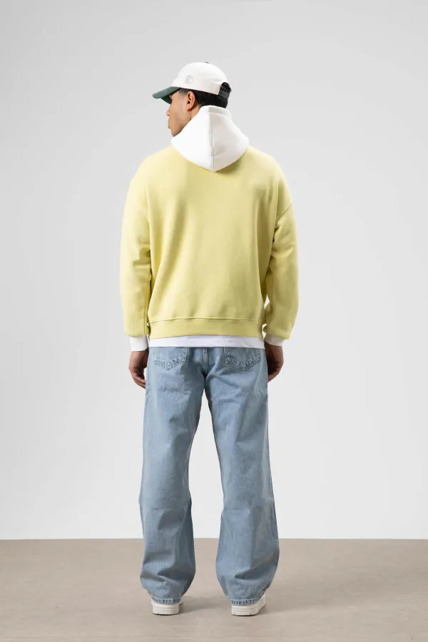 Sweat à capuche imprimé oversize jaune